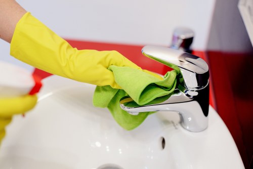 Cleaning team preparing a service visit with booking details