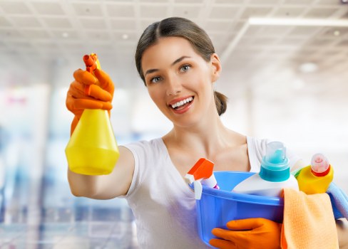 Local cleaners working in a Kentish Town property hallway and stairs