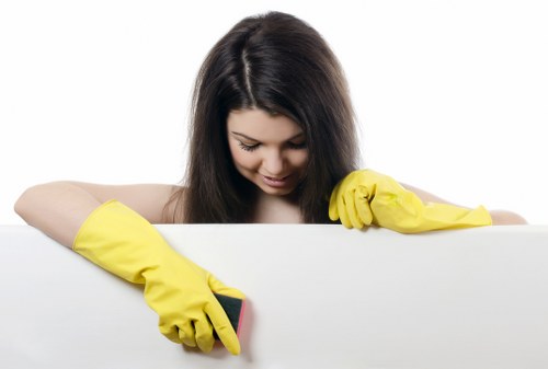 Local window cleaner working on a residential property in Kentish Town